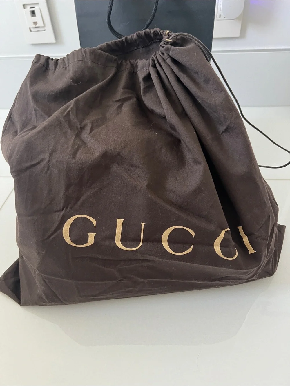 Gucci interlocking GG Black Soho Leather Shoulder Bag with Gold Chain and Tassel